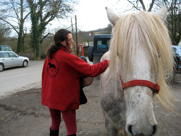 Meg Robbins horse riding on Dales ponies in Devon, UK, at West Steart Farm